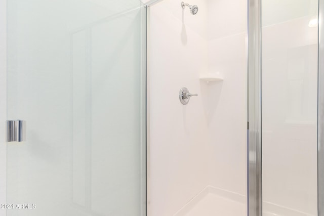 bathroom with an enclosed shower