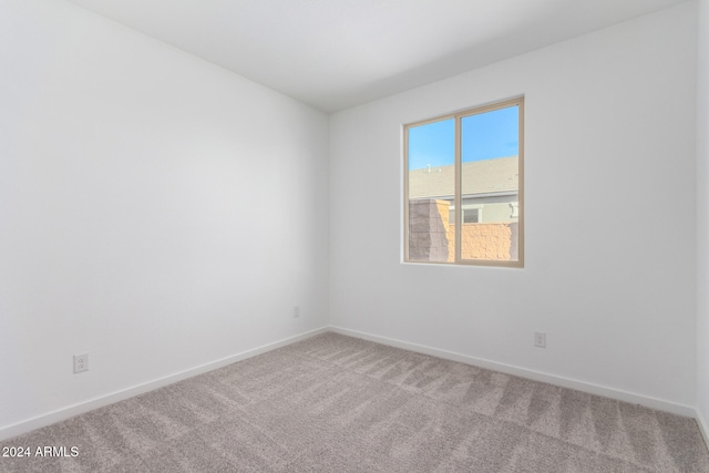 spare room with carpet flooring