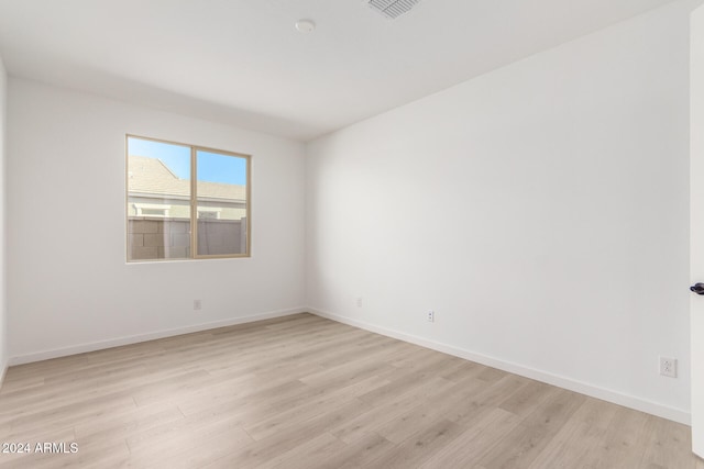 empty room featuring light hardwood / wood-style floors