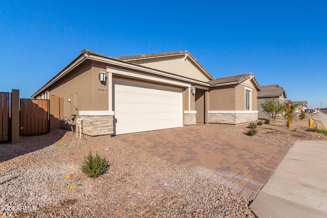 single story home with a garage