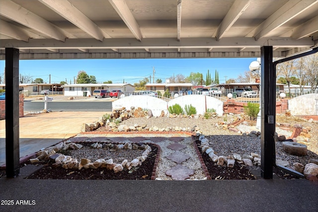 view of patio / terrace featuring fence