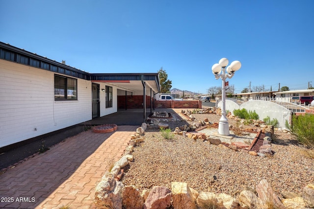 view of yard with a patio and fence