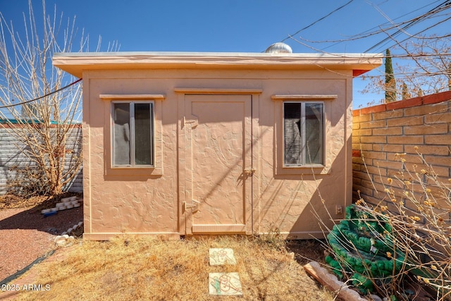 view of shed with a fenced backyard