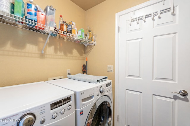 laundry area featuring laundry area and washing machine and clothes dryer