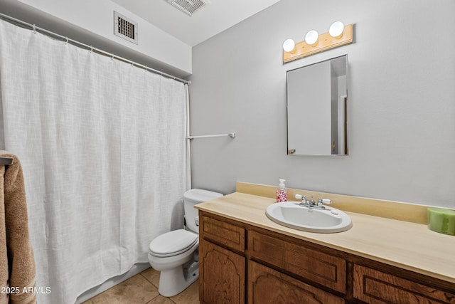 full bathroom with toilet, vanity, visible vents, and tile patterned floors