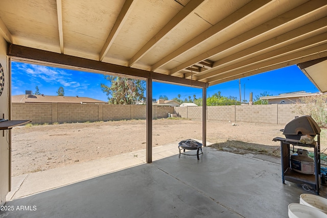 view of patio featuring grilling area and a fenced backyard