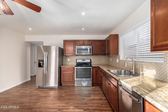 8143 E Obispo Ave, Mesa, AZ 85212 - kitchen featuring stainless steel appliances, a sink, dark wood-style flooring, decorative backsplash, and recessed lighting
