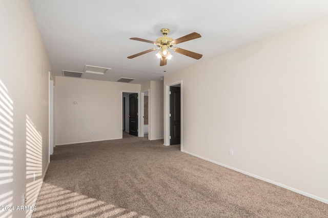 8143 E Obispo Ave, Mesa, AZ 85212 - carpeted empty room featuring attic access, ceiling fan, and baseboards