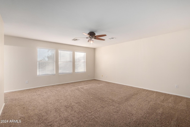 8143 E Obispo Ave, Mesa, AZ 85212 - carpeted empty room featuring ceiling fan and baseboards