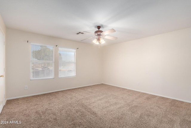 8143 E Obispo Ave, Mesa, AZ 85212 - empty room featuring carpet flooring, ceiling fan, and baseboards