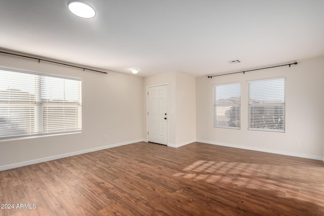 8143 E Obispo Ave, Mesa, AZ 85212 - spare room featuring wood finished floors and baseboards