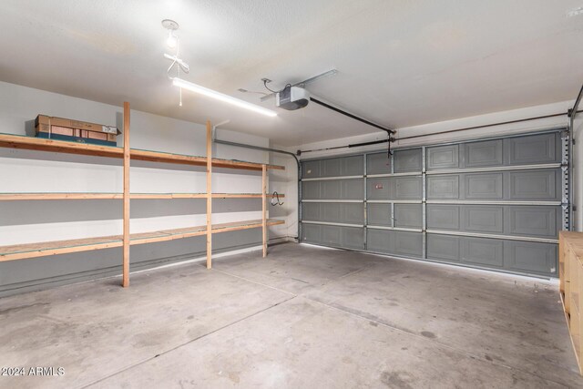 8143 E Obispo Ave, Mesa, AZ 85212 - garage featuring a garage door opener