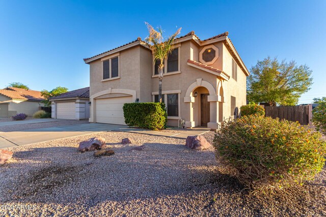 8143 E Obispo Ave, Mesa, AZ 85212 - view of front of property with concrete driveway, stucco siding, an attached garage, and a tiled roof