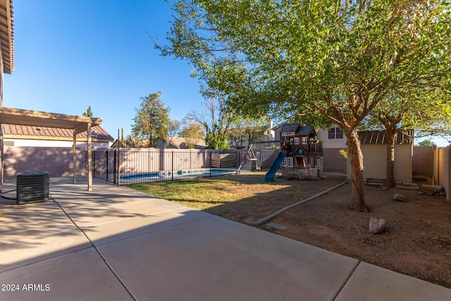 8143 E Obispo Ave, Mesa, AZ 85212 - fenced backyard with a patio area, a playground, and central air condition unit