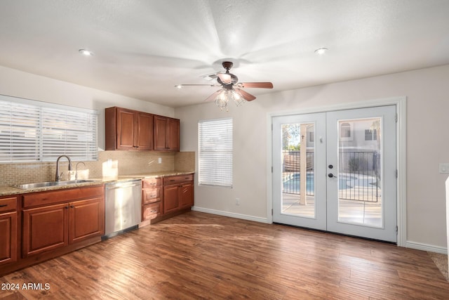 8143 E Obispo Ave, Mesa, AZ 85212 - kitchen with stainless steel dishwasher, a sink, a ceiling fan, french doors, and decorative backsplash