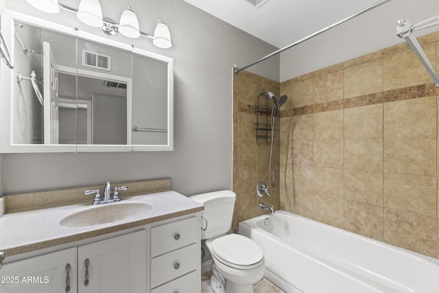 2633 E Garnet Ave, Mesa, AZ 85204 - bathroom featuring toilet, bathtub / shower combination, and vanity