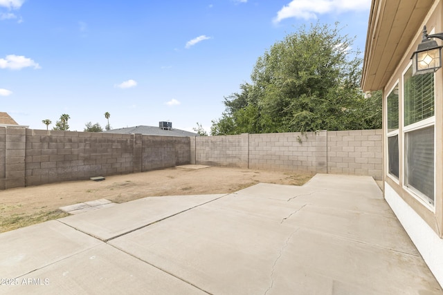 2633 E Garnet Ave, Mesa, AZ 85204 - fenced backyard with a patio