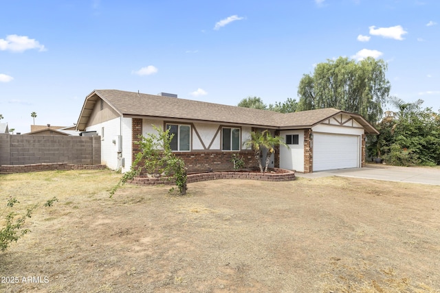 2633 E Garnet Ave, Mesa, AZ 85204 - ranch-style house featuring driveway, a garage, and brick siding