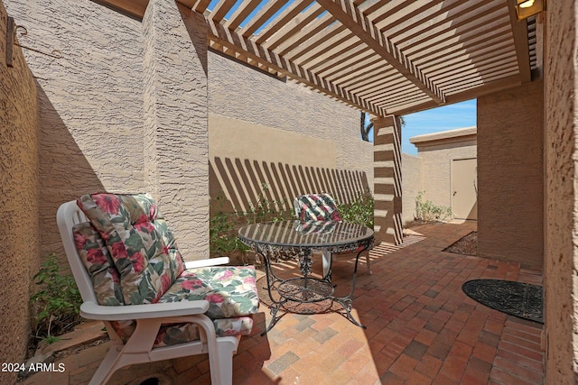 view of patio / terrace featuring a pergola