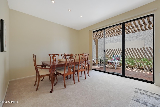 dining area with light carpet