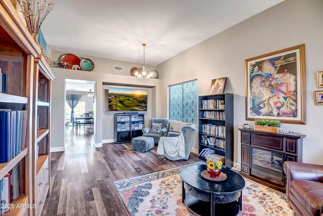 3948 W Rushmore Dr, Anthem, AZ 85086 - living area featuring baseboards, a chandelier, wood finished floors, and visible vents