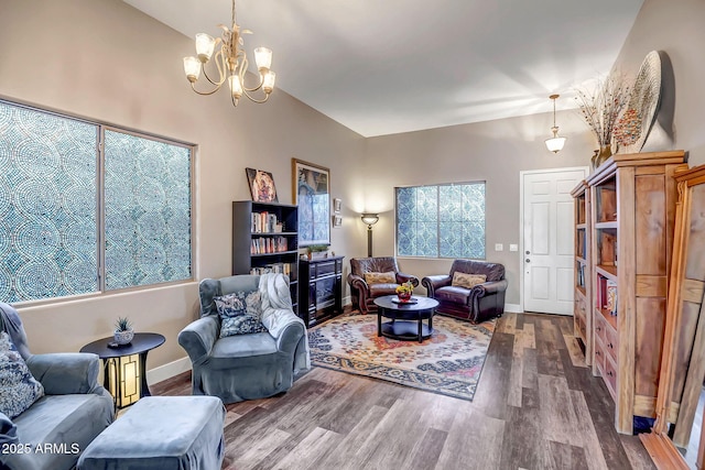 3948 W Rushmore Dr, Anthem, AZ 85086 - living room with baseboards, wood finished floors, and a notable chandelier