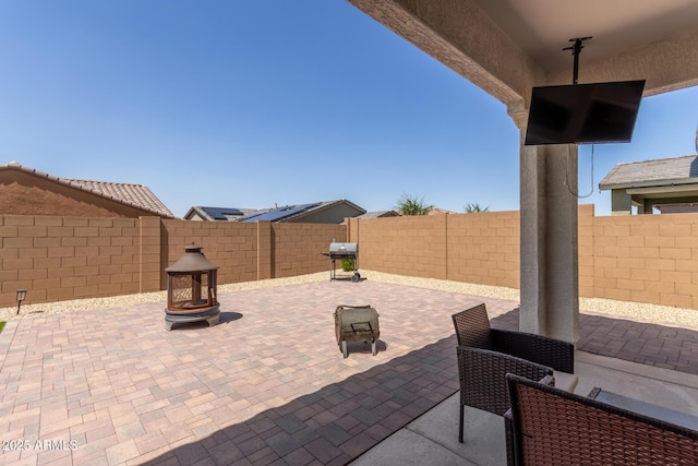 3832 W Mcneil St, Laveen, AZ 85339 - fenced backyard featuring a patio area and grilling area