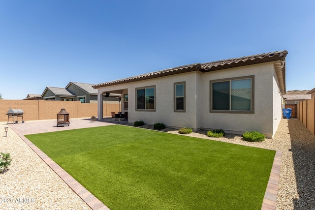 3832 W Mcneil St, Laveen, AZ 85339 - rear view of property with stucco siding, a patio, and a tiled roof