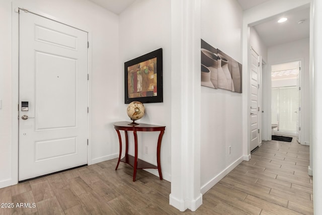 3832 W Mcneil St, Laveen, AZ 85339 - hall with light wood finished floors, baseboards, and recessed lighting