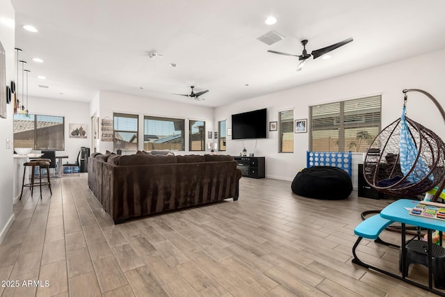 3832 W Mcneil St, Laveen, AZ 85339 - living area with ceiling fan, plenty of natural light, light wood-type flooring, recessed lighting, and baseboards