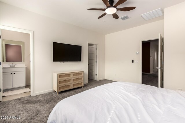 2256 W Laurie Ln, Phoenix, AZ 85021 - bedroom with carpet floors, ensuite bathroom, baseboards, a ceiling fan, and a sink