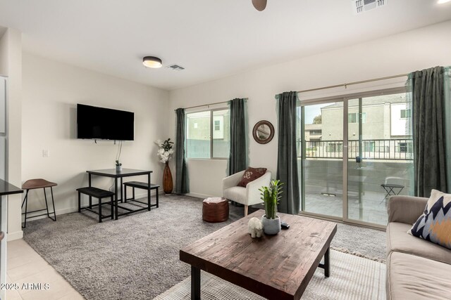 2256 W Laurie Ln, Phoenix, AZ 85021 - living area featuring plenty of natural light and baseboards