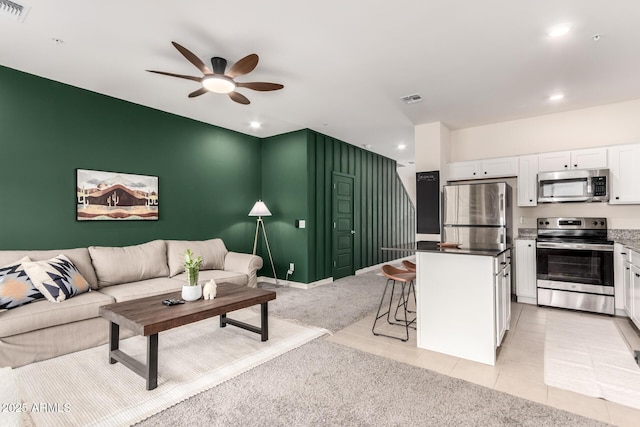 2256 W Laurie Ln, Phoenix, AZ 85021 - living area featuring a ceiling fan, light tile patterned flooring, and recessed lighting