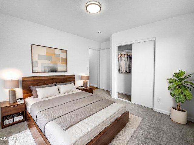 carpeted bedroom with a closet