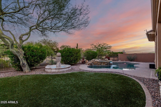 41715 N River Bend Rd, Phoenix, AZ 85086 - view of yard featuring a fenced backyard, a fenced in pool, and a patio area