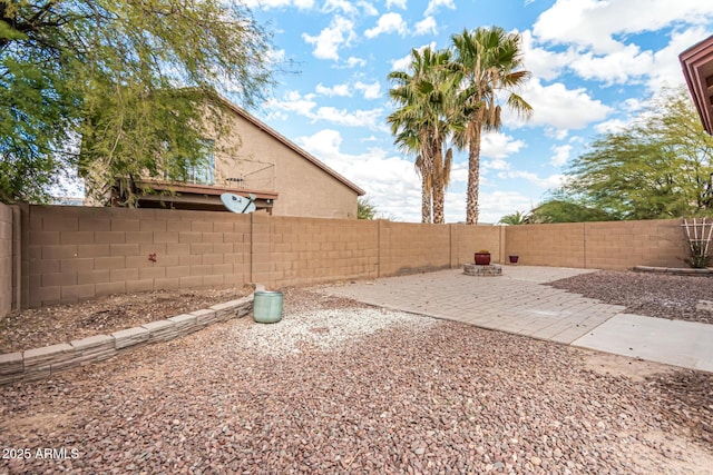 view of yard featuring a fenced backyard and a patio