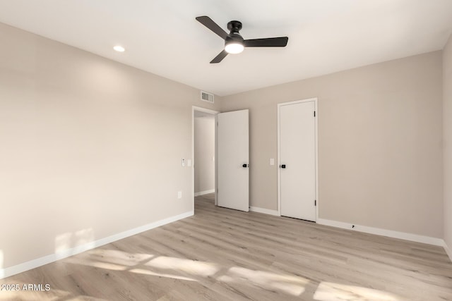 unfurnished bedroom featuring baseboards, visible vents, recessed lighting, and light wood-style floors