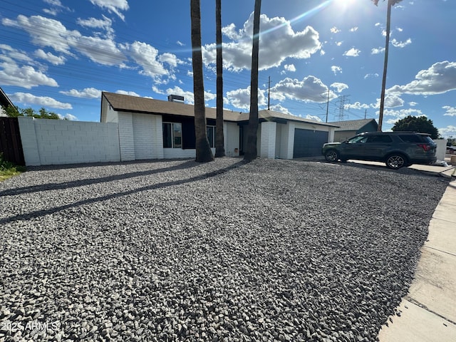 exterior space with a garage