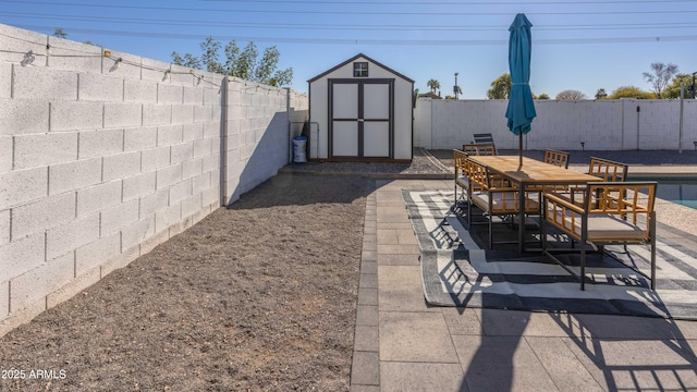 view of patio / terrace featuring a shed