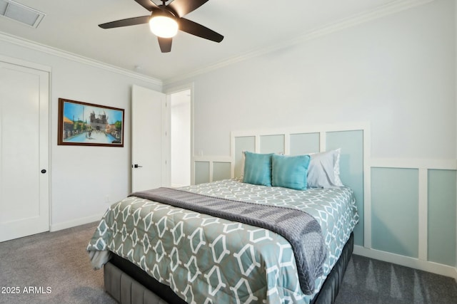 bedroom featuring ornamental molding, carpet, and ceiling fan