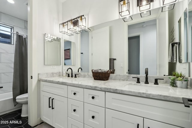 full bathroom featuring shower / bath combination with curtain, tile patterned floors, vanity, and toilet