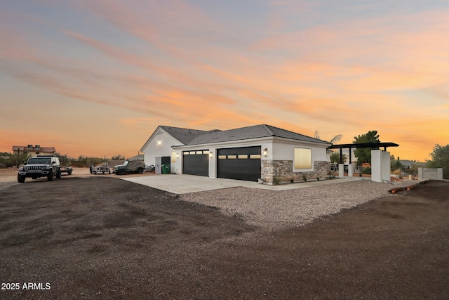 view of front of property with a garage