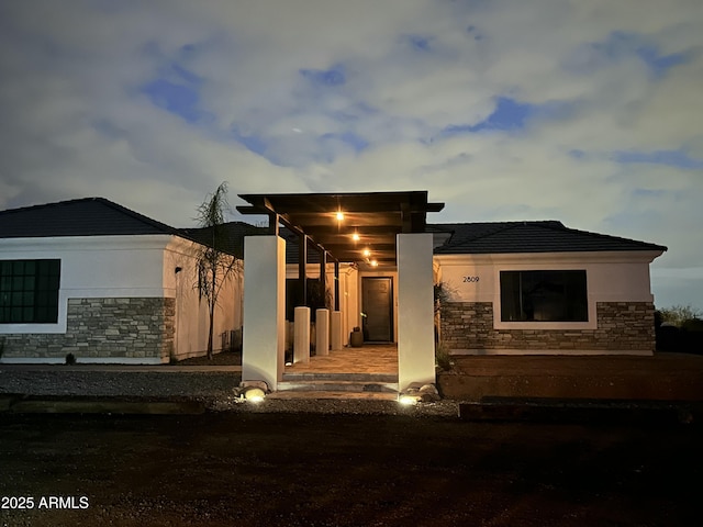 view of front of home featuring a patio area