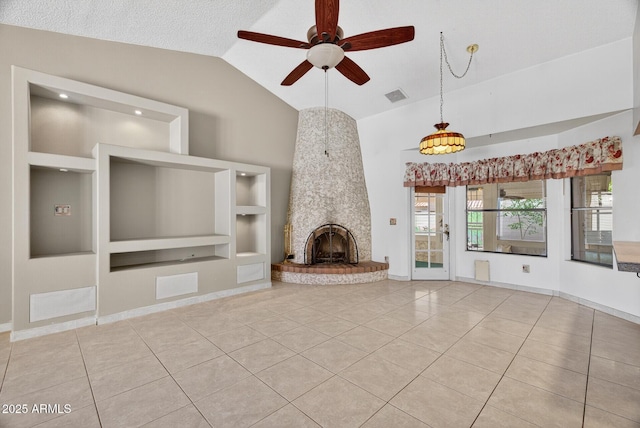 9839 W Utopia Rd, Peoria, AZ 85382 - unfurnished living room featuring a ceiling fan, light tile patterned flooring, lofted ceiling, built in features, and a fireplace