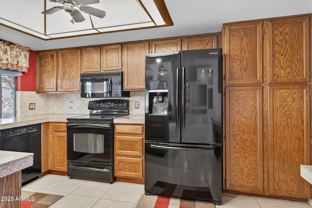 9839 W Utopia Rd, Peoria, AZ 85382 - kitchen featuring black appliances, light countertops, and a ceiling fan