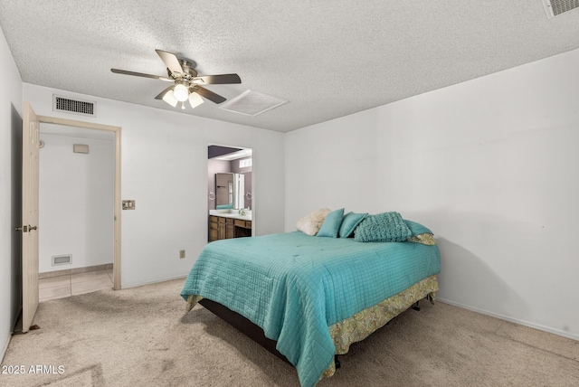 9839 W Utopia Rd, Peoria, AZ 85382 - bedroom featuring a textured ceiling, light carpet, a ceiling fan, and ensuite bath