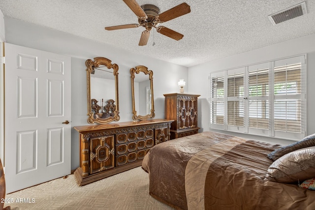 9839 W Utopia Rd, Peoria, AZ 85382 - bedroom featuring a textured ceiling and ceiling fan