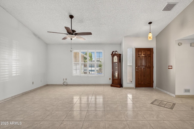 9839 W Utopia Rd, Peoria, AZ 85382 - foyer entrance with a textured ceiling, ceiling fan, and light tile patterned flooring