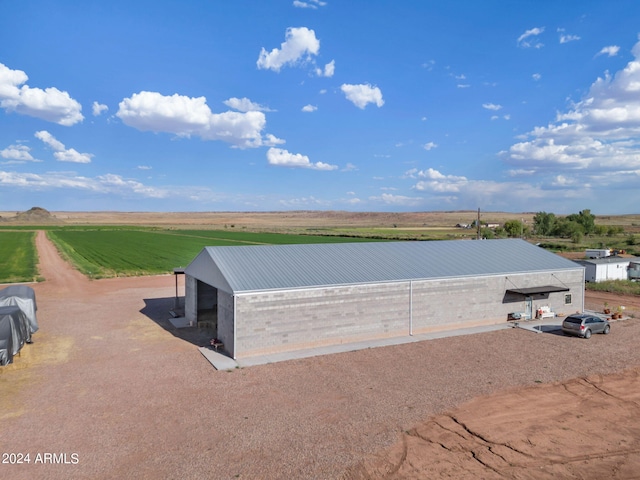 exterior space featuring a rural view