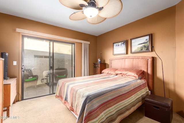 bedroom featuring ceiling fan, carpet floors, and access to exterior